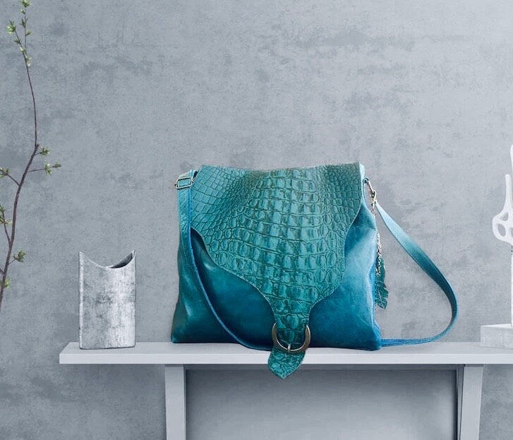 Teal leather crossbody, asymmetrical flap