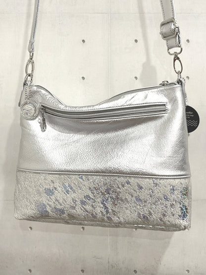 Holographic iridescent cowhide and metallic silver leather bag