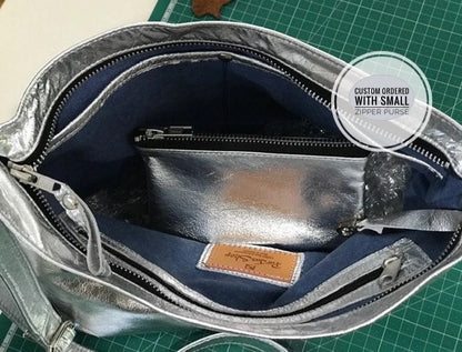 Silver Metallic leather handbag with zipper closure and zipper purse and chambray lining