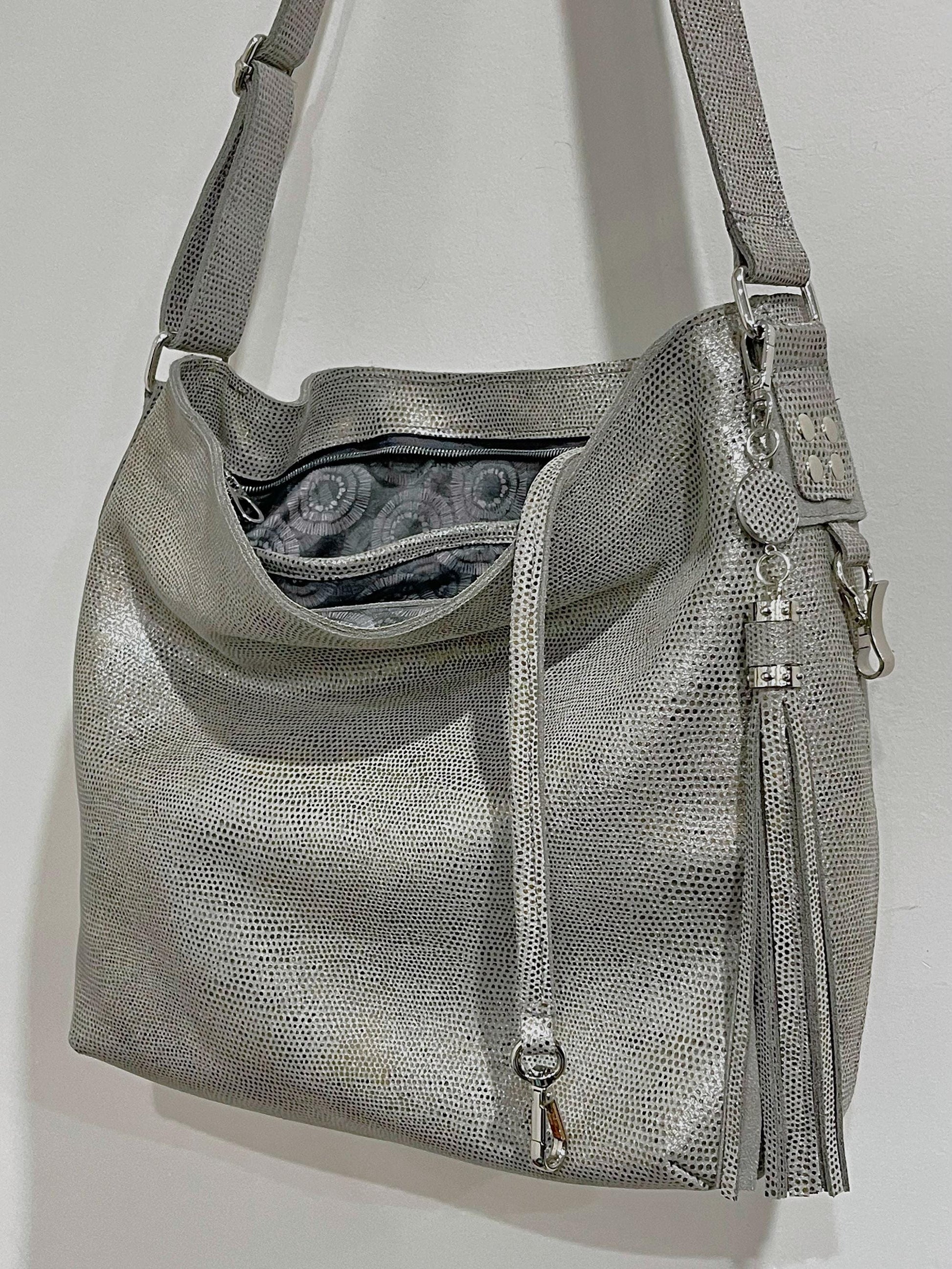 metallic pearl silver hobo bag with tie dye lining and key clasp hook