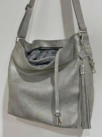 metallic pearl silver hobo bag with tie dye lining and key clasp hook