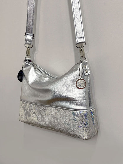 Holographic iridescent cowhide and metallic silver leather bag