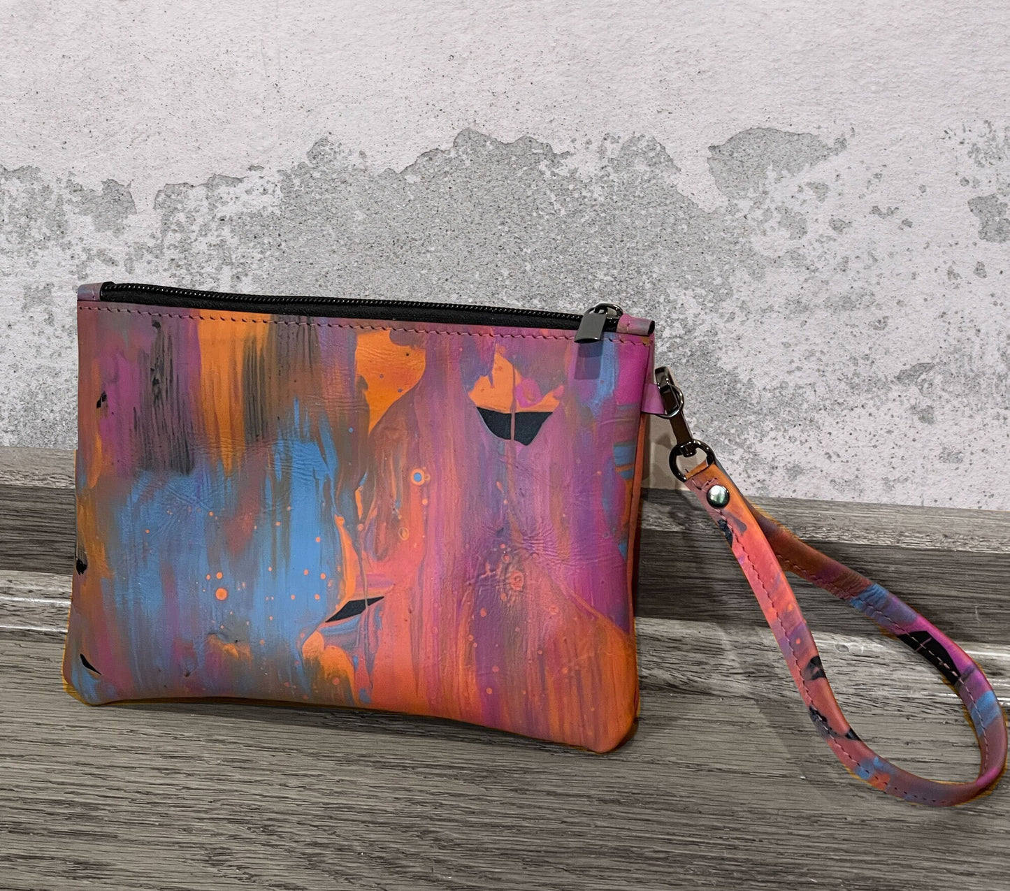 handmade printed leather wristlet blue orange pink