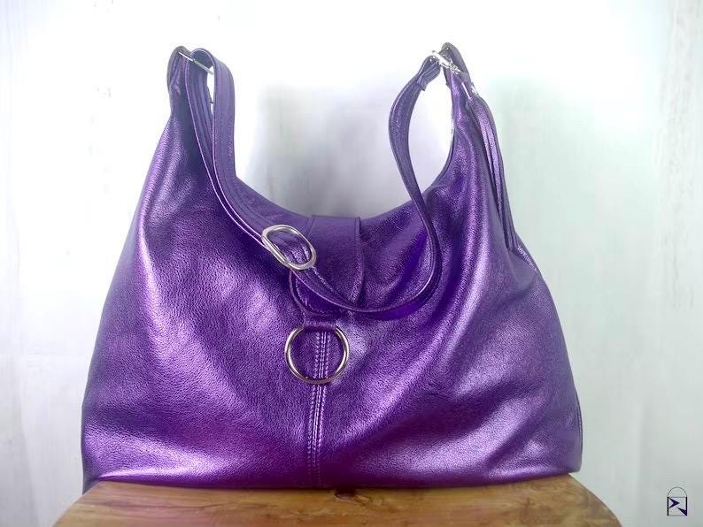Metallic Purple Hobo bag with silver hardware and wide adjustable strap and O ring feature
