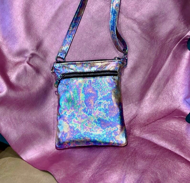 Holographic crossbody bag fits iphone and essentials. removable strap. outside zipper pocket