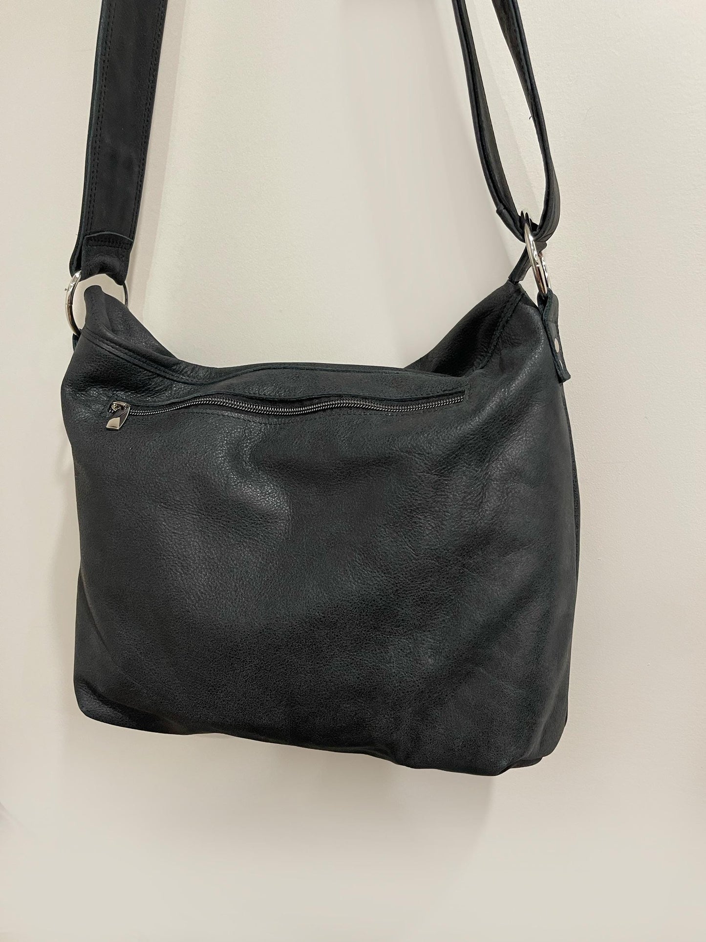 Distressed Black Leather Crossbody Bag with asymmetrical flap