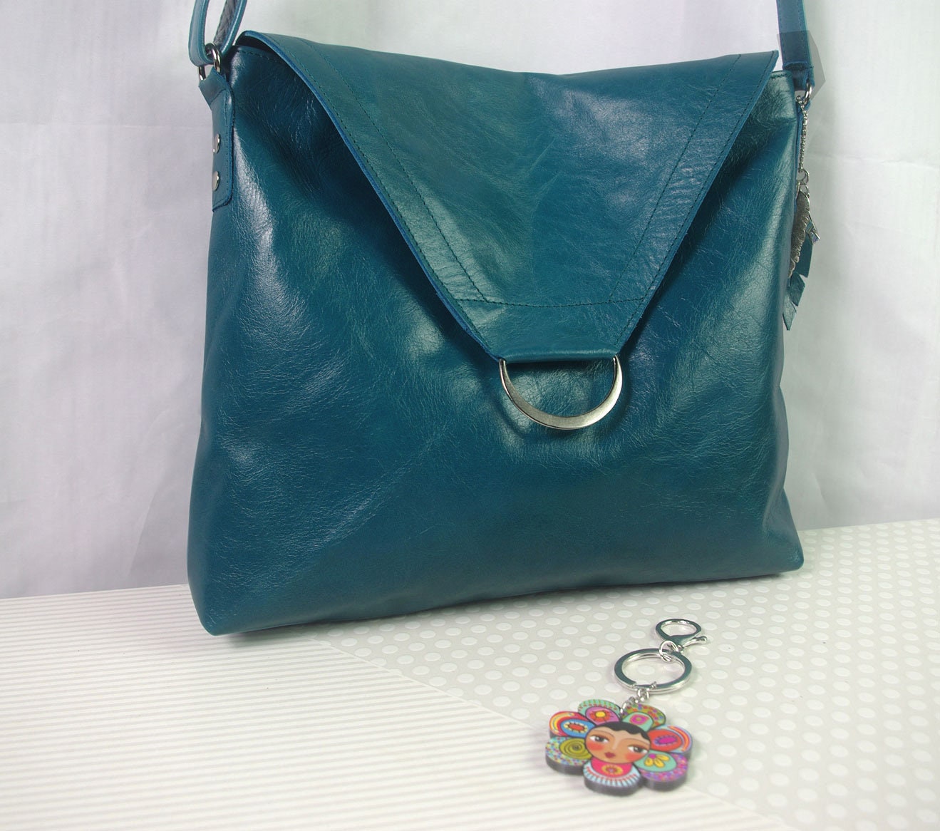 Deep teal leather bag outside zippocket key clasp key hook
