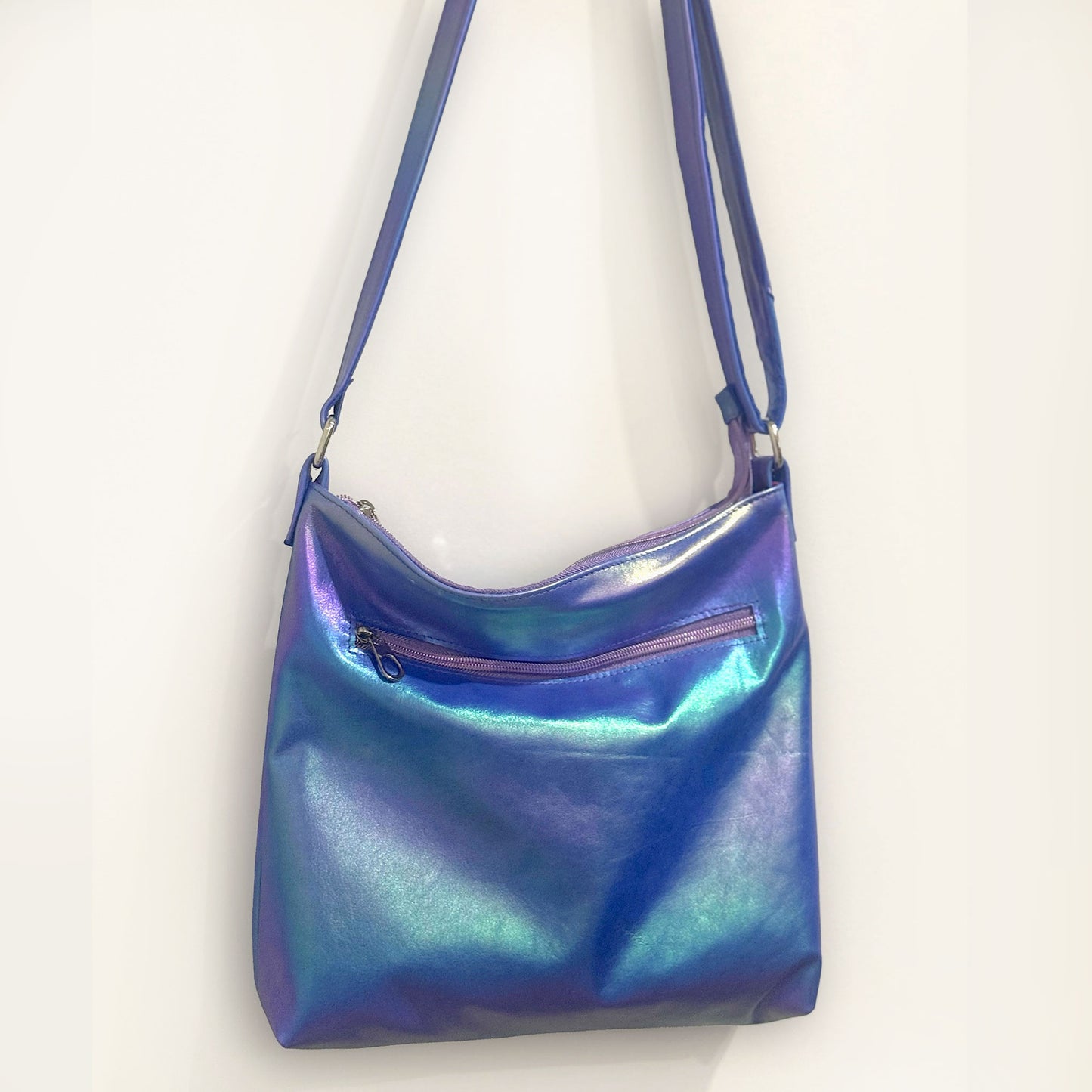 Metallic Rainbow on blue Aurora leather crossbody bag, smooth soft highlights leather bag