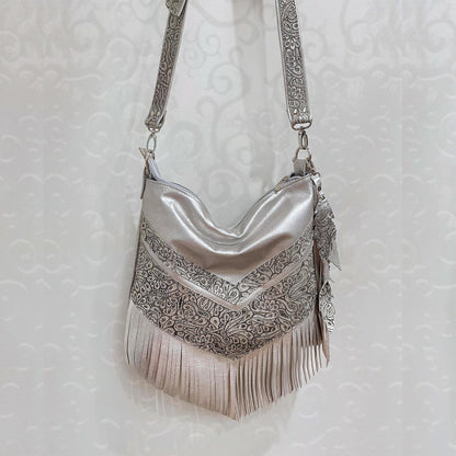 Metallic silver Leather Fringe Hobo Bag with featured tooled leather