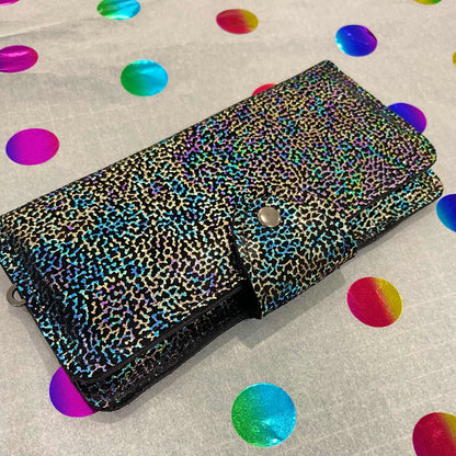 Rainbow coral on black patterned wallet closed