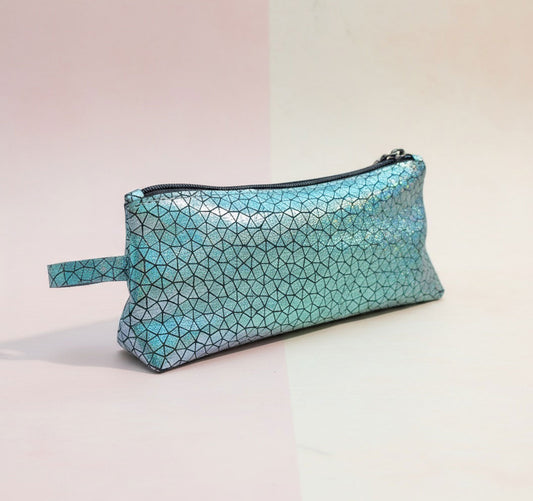 iridescent Blue geometric patterned pouch on shown on an angle