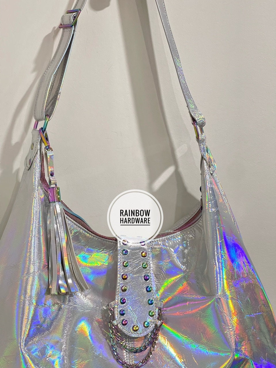 close up of Holographic handbag with rainbow hardware