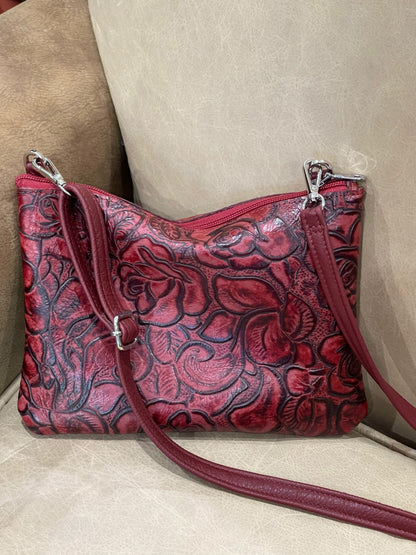 Deep red tooled floral leather wristlet or crossbody, floral embossed