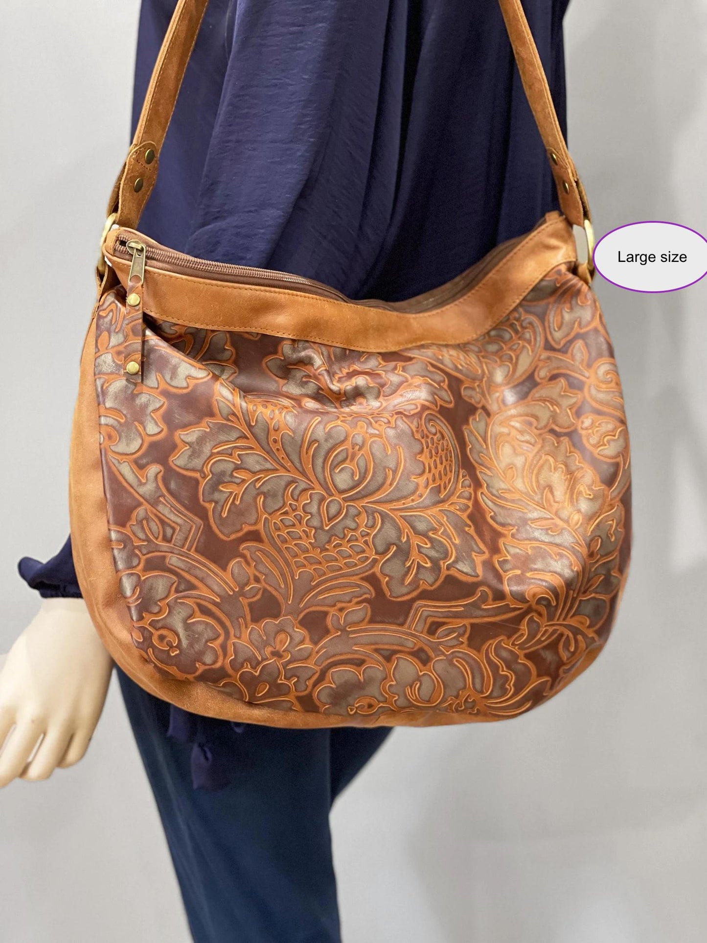 Large brown tooled embossed leather hobo bag