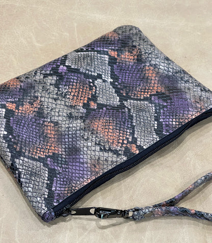 Snake embossed clutch leather wristlet