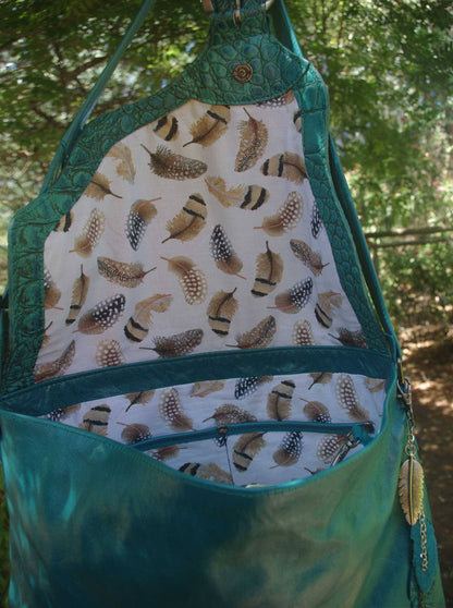 Teal leather crossbody, asymmetrical flap