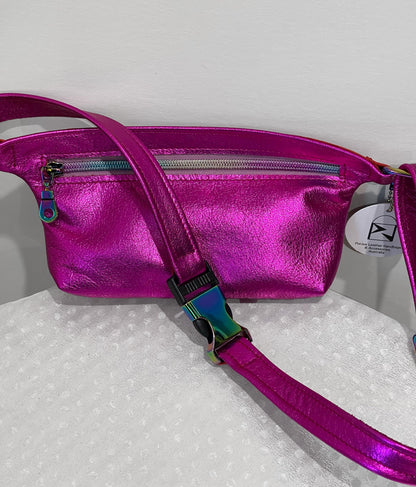 Shiny metallic pink fanny pack with rainbow hardware