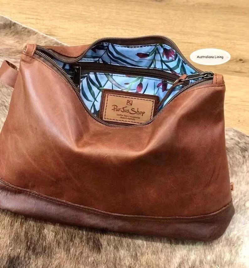 Brown leather toiletry bag with Australian bush lining and inside zipper pocket