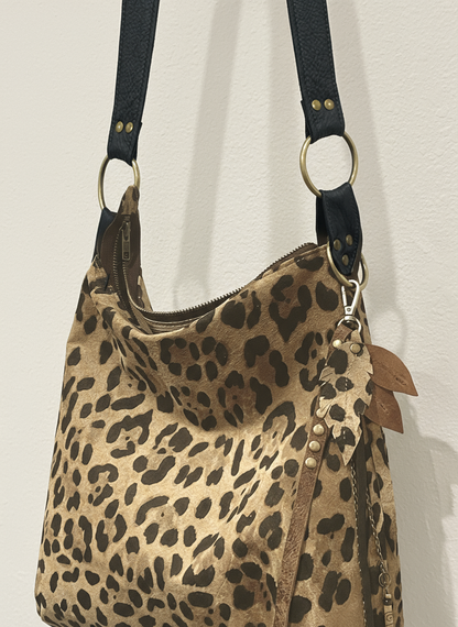 Leopard bag on cool off-white wall